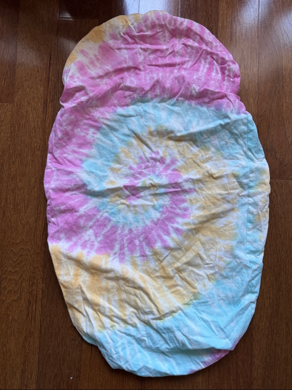 Snoo Tie-Dye Oval bassinet sheet - Pink, Blue & Yellow